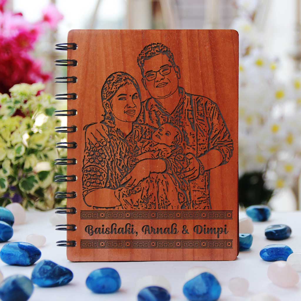 Baby journal engraved with photo. Looking for gifts for new parents? This baby memory book engraved with a photo is one of the best new mum and dad gifts.