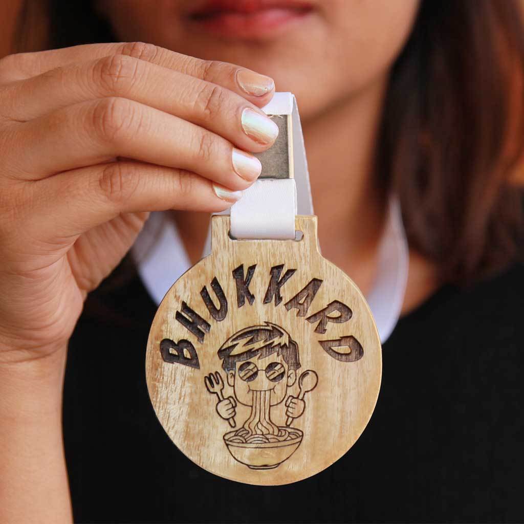 Bhukkad Wooden Medal With Ribbon. This Funny Medal Is The Best Gifts For Foodies. This Custom Engraved Medal Makes A Funny Gift For Friends & Great Friendship Day Gifts