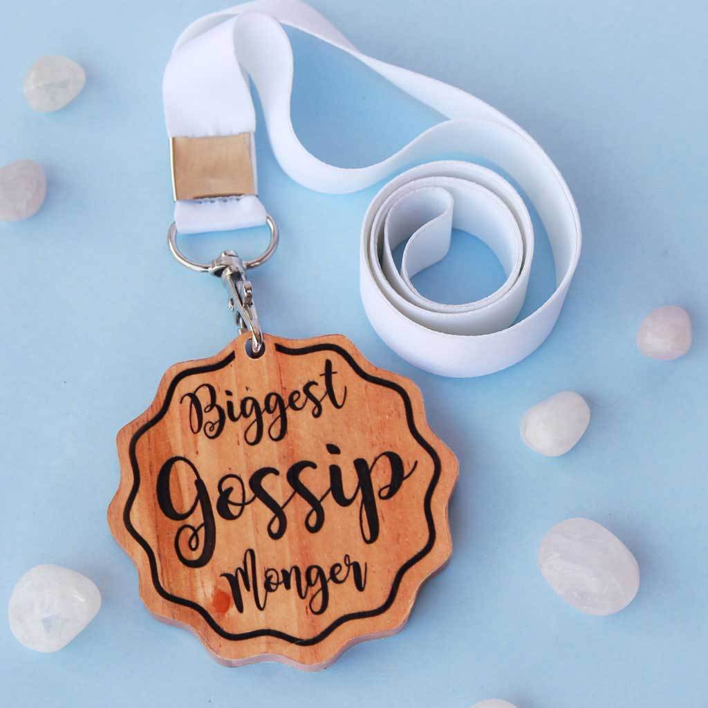 Biggest Gossip Monger Funny Medal That Comes With A Ribbon. This is the best funny gift for friends and makes perfect office gifts.