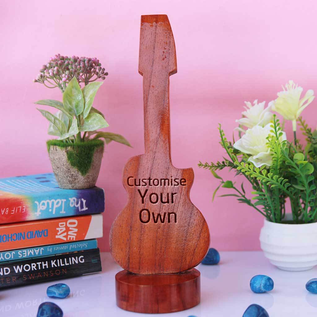 Wooden Guitar Shaped Award & Trophy. Customise Your Own Wooden Trophies & Awards. Create Your Own Custom Trophies. Personalised Music Awards for the Best Musician or Music Fan. Make Your Own Music Awards, Best Employee Award or Other Employee Appreciation Awards, Funny Awards and Trophies