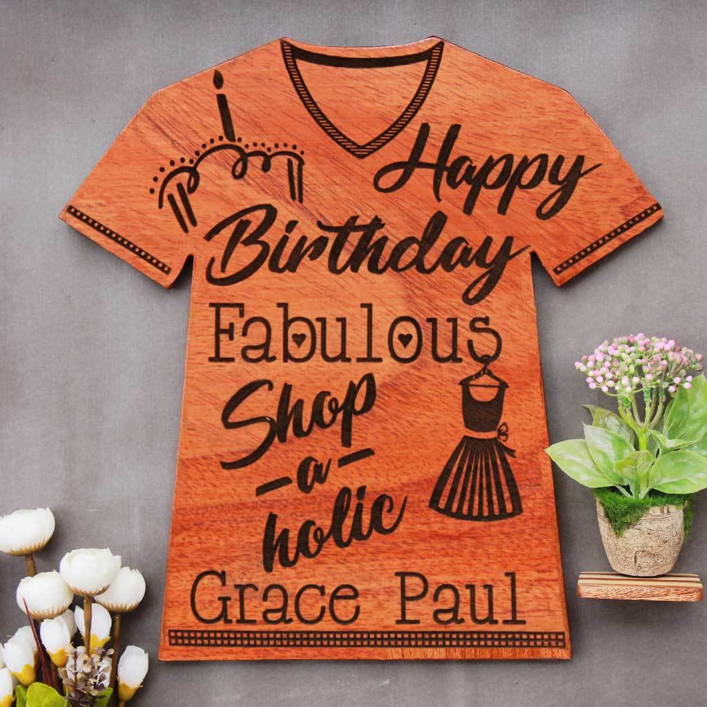 Happy Birthday Fabulous Shopaholic Wooden Plaque In The Shape Of A T-shirt. This Personalized Award Trophy Makes One Of The Best Gifts For Shopaholics - Looking For Unique Birthday Gifts ? Shop The Best Gifts For Loved Ones From The Woodgeek Store. 