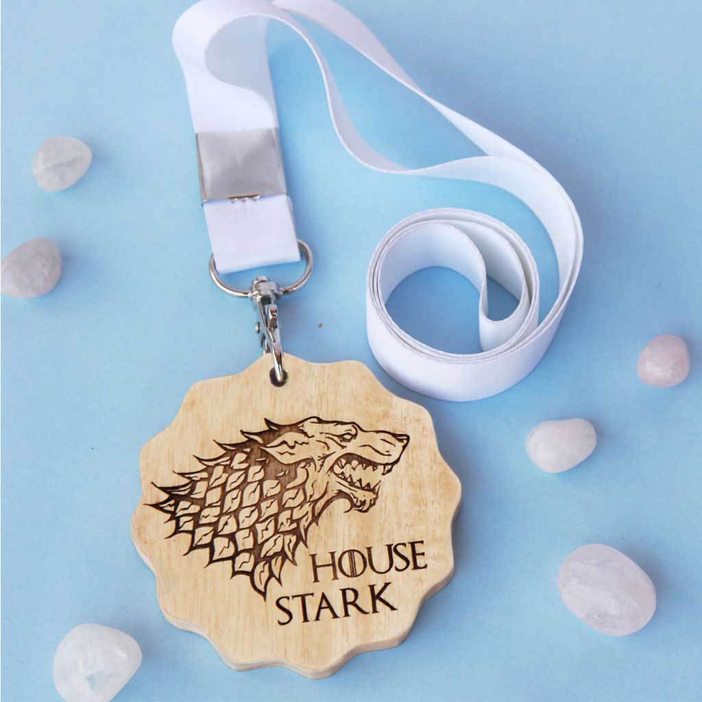 House Stark Engraved Medal. A unique award that makes great gifts for game of thrones fans. Buy House Stark sigil engraved custom medals online from The Woodgeek Store. 