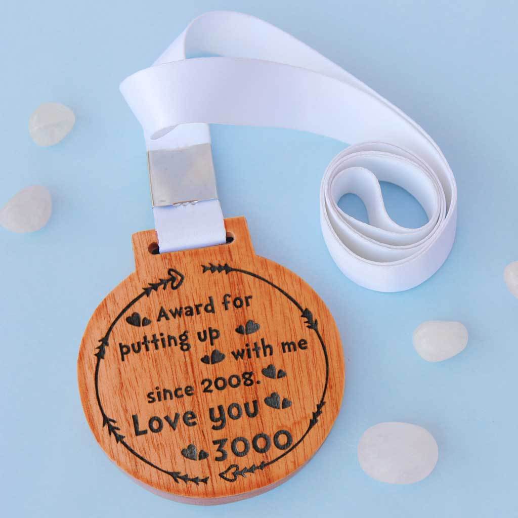 Award For Putting Up With Me. Love You 3000 Wooden Medal. Custom Medals Makes One Of The Most Romantic Gifts For Husband, Boyfriend, Wife, Girlfriend. This Trophy Medal Is The Best Avengers Gifts. Looking For Personalized Gifts? This Unique Wooden Medal Makes A Cute Gift For Him Or Her.