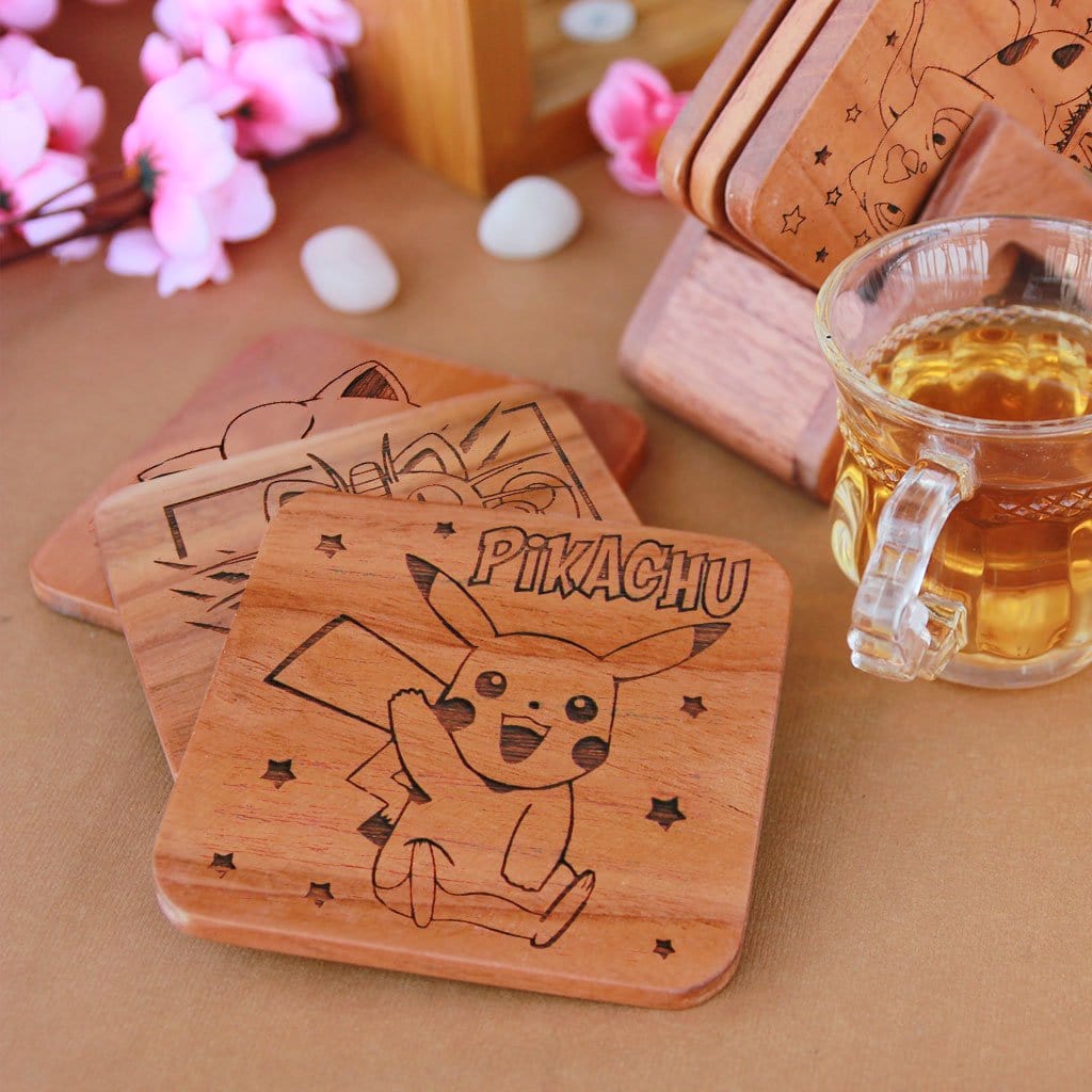 Pokemon Coasters. A Set Of Wooden Coasters Engraved With Bulbasaur, Squirtle, Meowth, Jigglypuff, Pikachu and Charmander Pokemons. Pokemon gifts for Pokemon fans. Shop Coasters Online at Woodgeek Store.