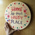 Home is our happy place floral circular wood sign 