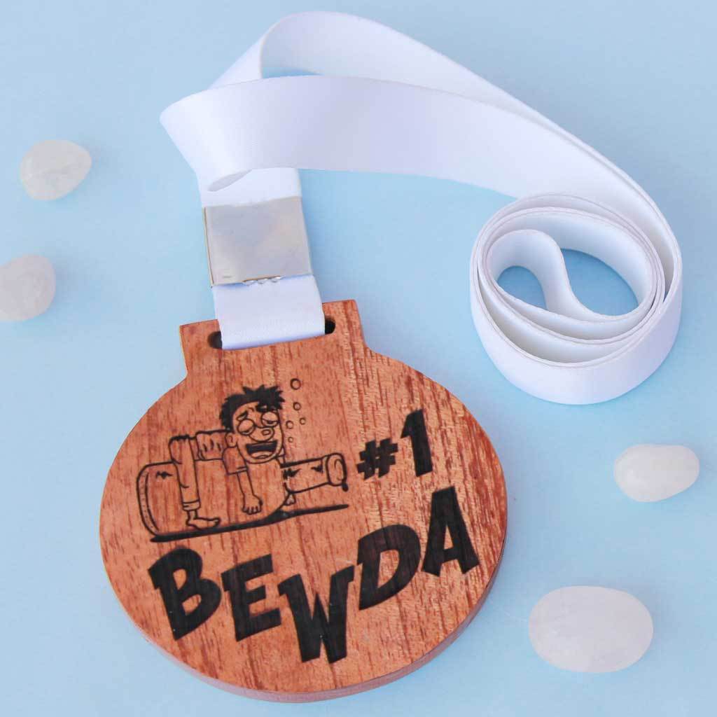 #1 Bewda Wooden Medal With Ribbon. This Funny Medal Is Engraved On Mahogany or Birch Wood. These Funny Medals Make Great Friendship Day Gifts Or A Simple Birthday Gift For Friends.