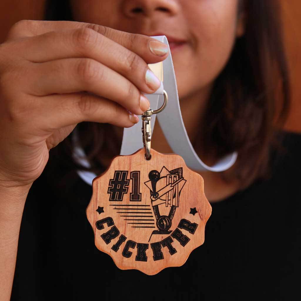 #1 Cricketer Sports Medal. This engraved wooden medal is the best gift for cricket lovers. Buy more customised gifts for sports lovers from The Woodgeek Store.