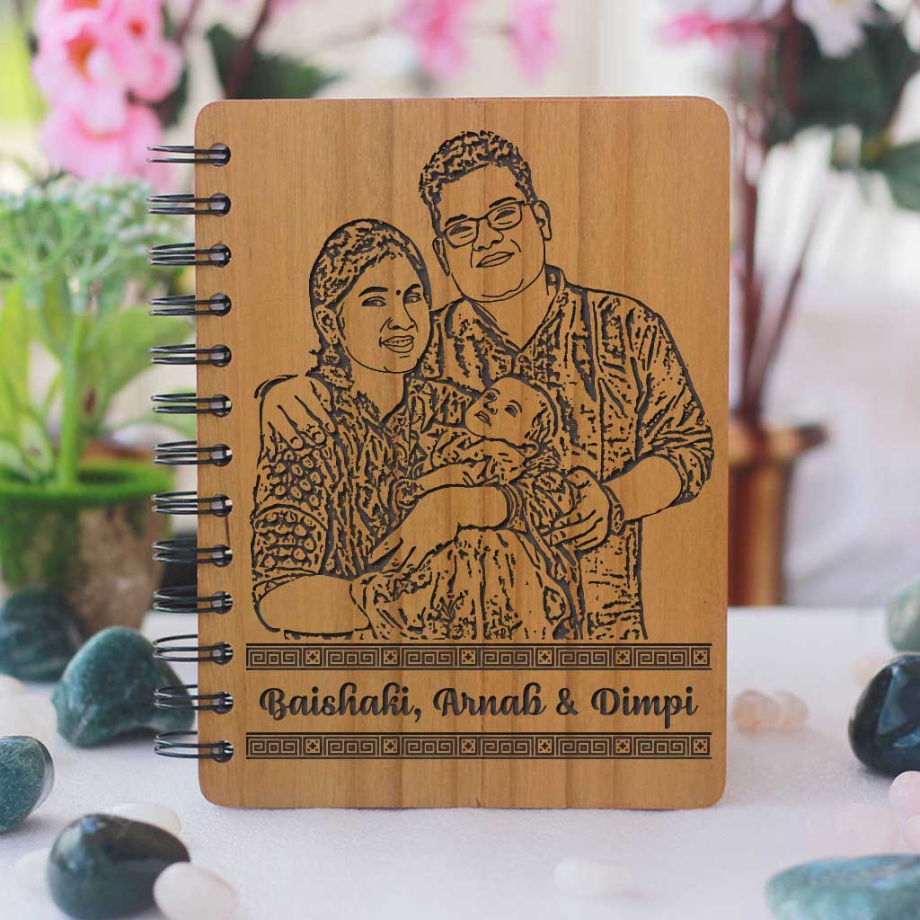 Baby journal engraved with photo. Looking for gifts for new parents? This baby memory book engraved with a photo is one of the best new mum and dad gifts.