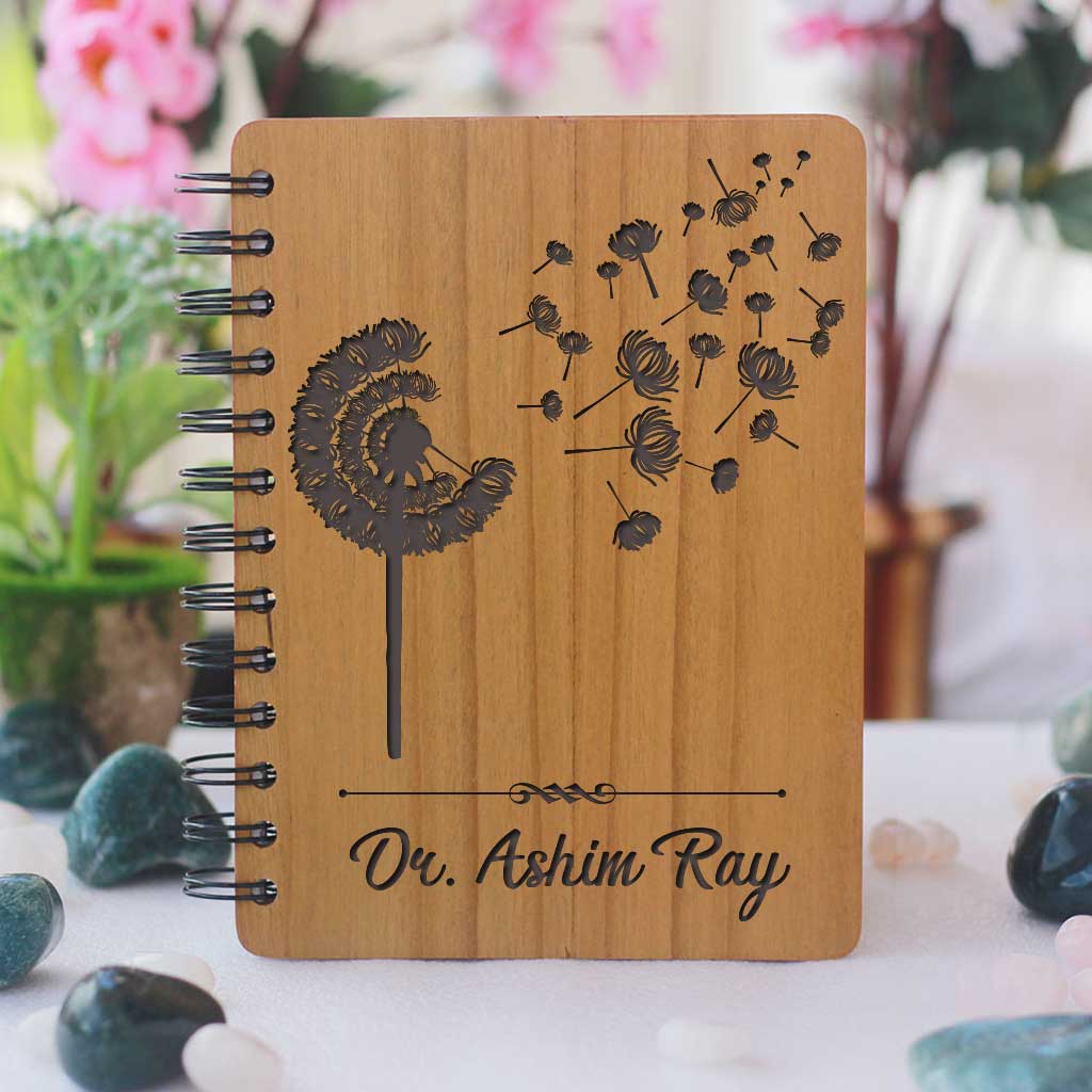 A Minimalist Wooden Notebook Engraved With Dandelion & Personalized With Doctors Name. Looking For Thank You Gifts For Doctors, Retirement Gifts For Doctors Or Graduation Gifts For Doctors? This Spiral Notebook Is The Best Gifts For Doctors.