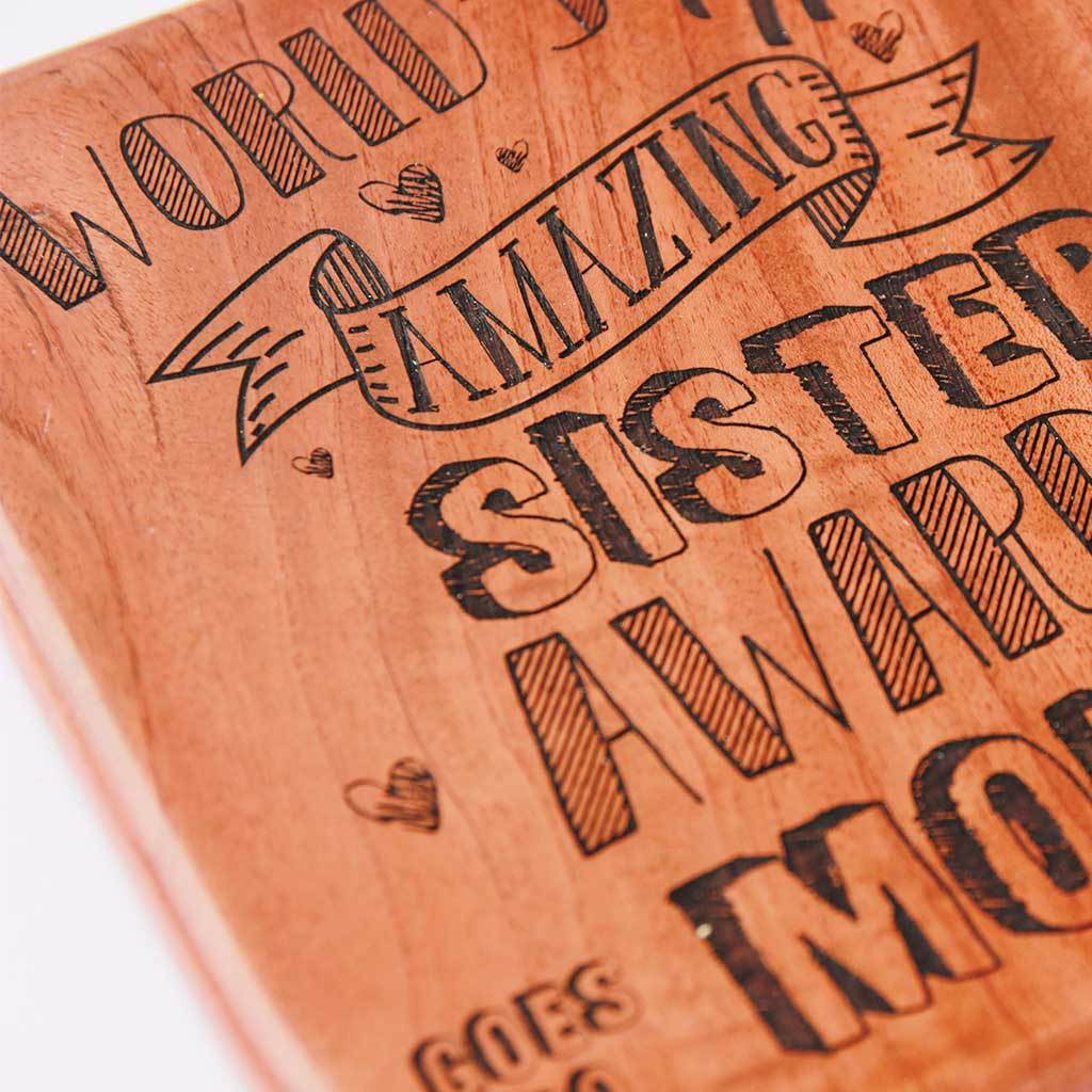 World&#39;s Most Amazing Sister Award. This Wooden Trophy makes great gifts for sister. Custom trophies engraved with name makes a good birthday gift for sister. This Custom Award is a Funny Gift for an amazing Sister.