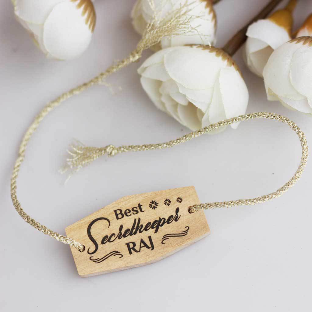 Best Secretkeeper Personalised Rakhi and Raksha Bandhan Greeting Card - This Wooden Rakhi Comes With A Wooden Greeting Card Engraved With Raksha Bandhan Greetings Makes The Best Rakhi Gifts for Brother - Buy The Best Rakhi And Send Personalized Rakhi Gifts Online With Woodgeek Store.