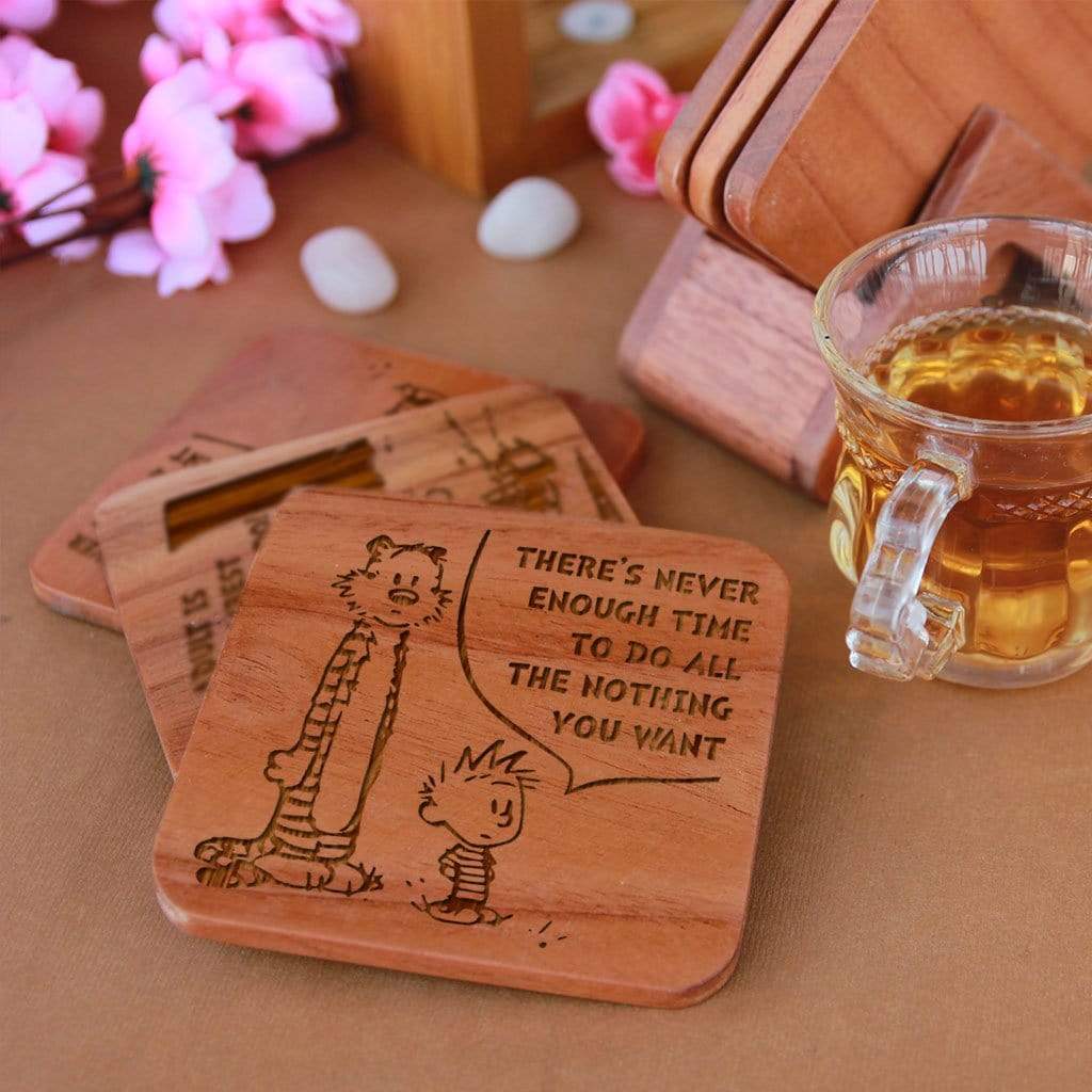 Calvin and Hobbes - Wooden Coaster Set With Holder. Gift coasters engraved with Calvin and Hobbes quotes. This coaster set is the best engraved wooden coasters and funky coaster which can be used as tea coaster and coffee coaster. This square coaster and natural wood coaster is one of the best gifts for Calvin and Hobbes fans.