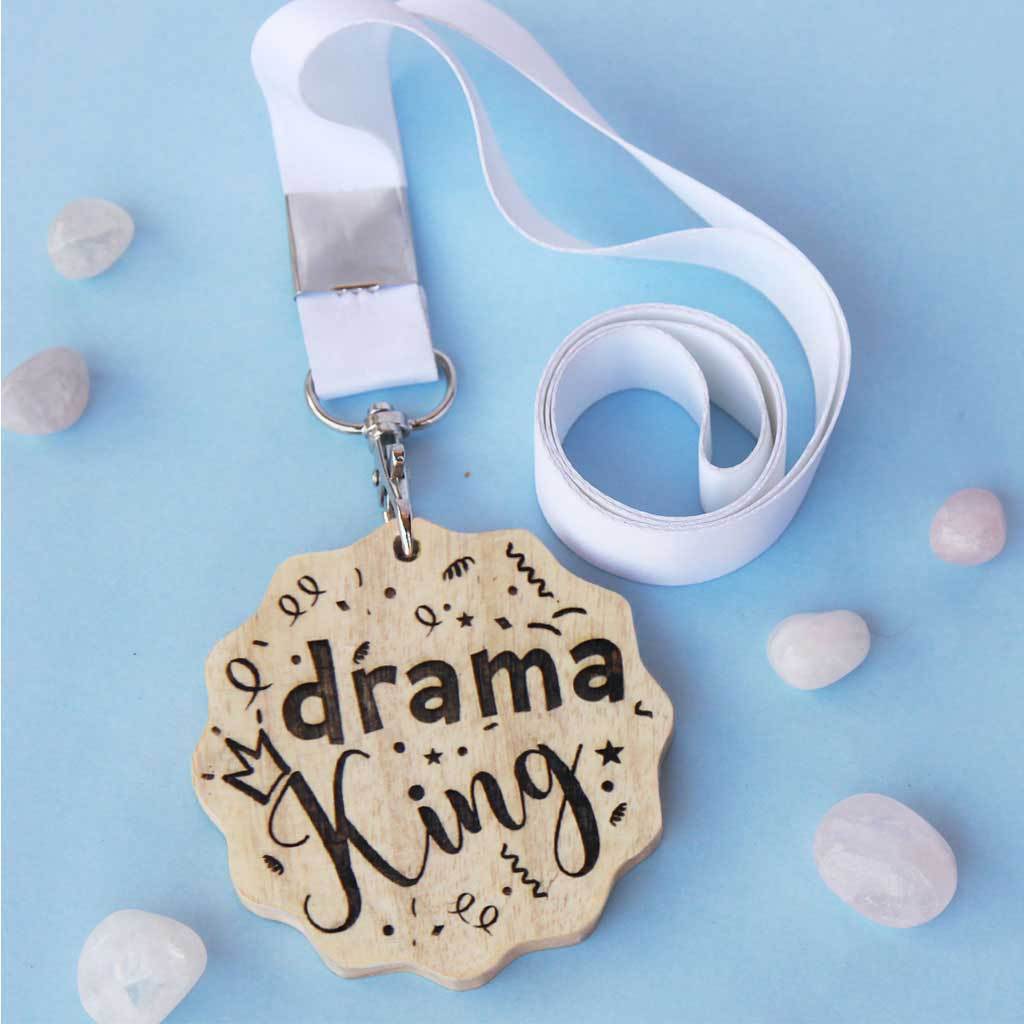 Drama King Wooden Medal. A funny award for the drama king. This custom medal makes great presents for friends. These engraved medals are funny gift ideas for brothers.
