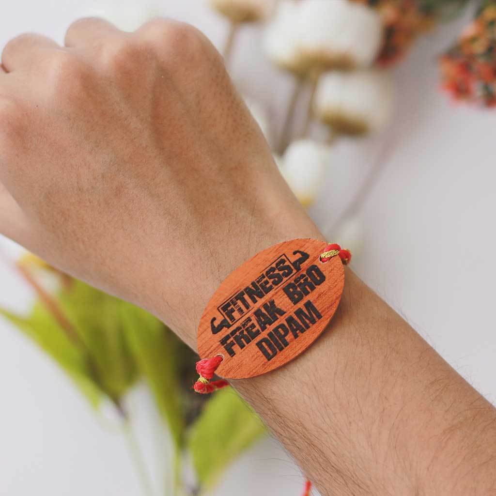 Fitness Freak Bro Personalised Rakhi and Raksha Bandhan Greeting Card - This Wooden Rakhi and Wooden Greeting Card Is The Best Raksha Bandhan Gifts for Brother - Buy Rakhi Online India And Wish Your Brother a Happy Rakhi With Personalized Gifts From The Woodgeek Store.