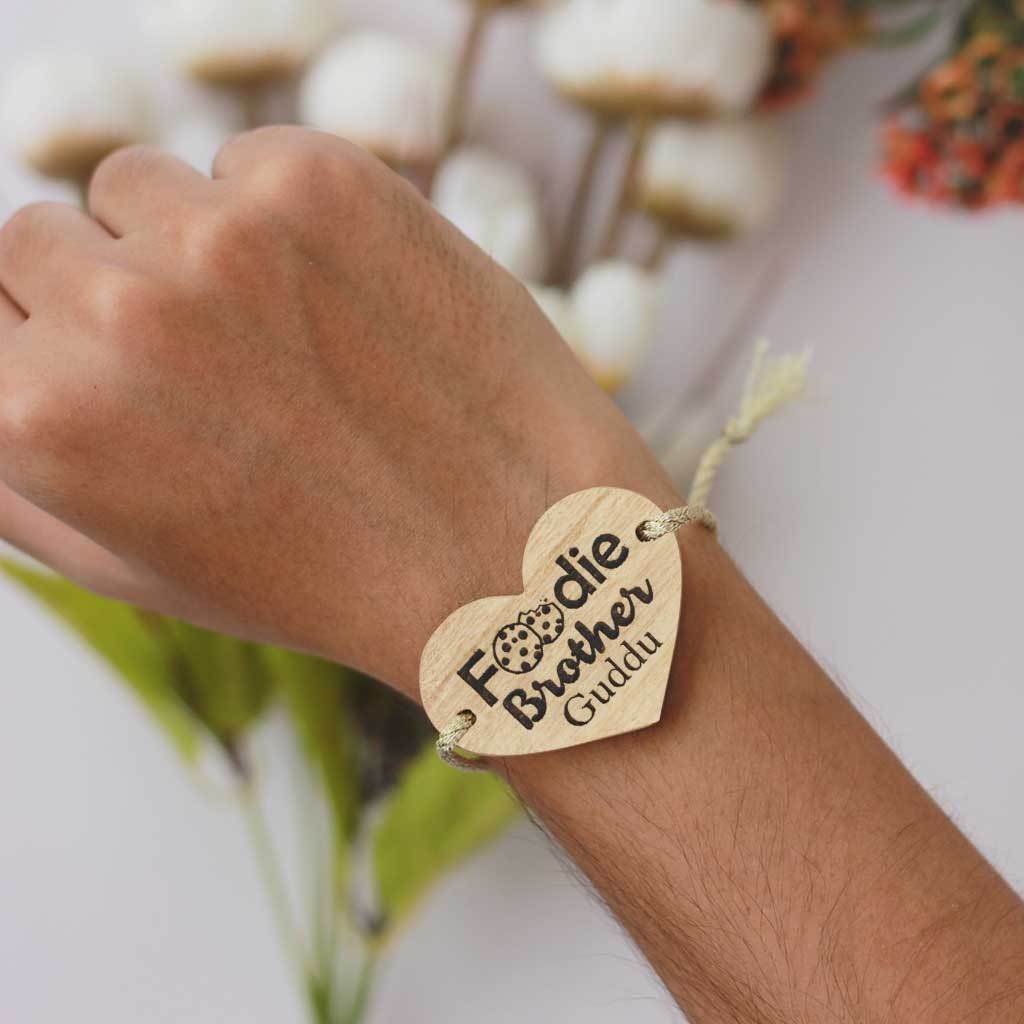 Foodie Brother Personalised Rakhi With Name & Raksha Bandhan Greetings Engraved On Wooden Card. These are the Best Rakhi Gifts. Buy Rakhis Online in India & Send Rakhis Online With Woodgeek Store.