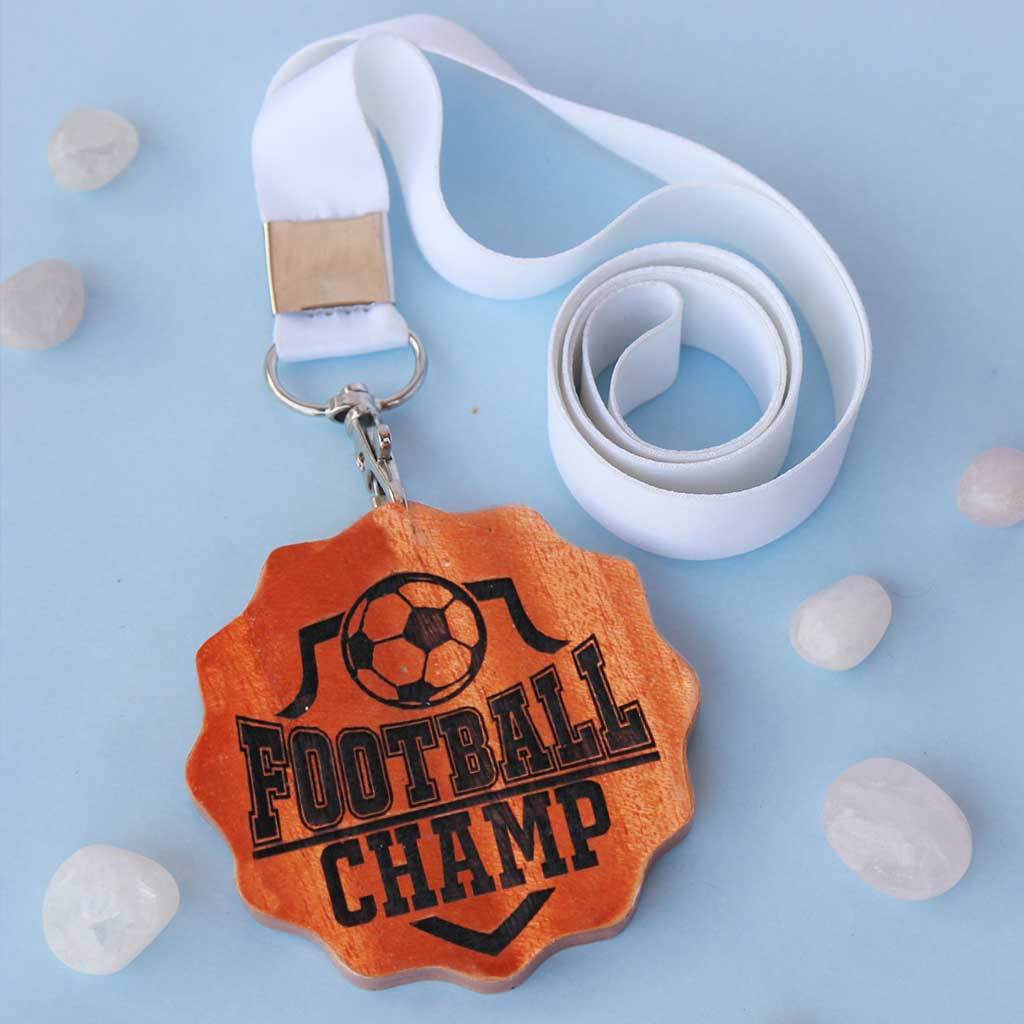 Football Champ Engraved Medal. Football Medal For The Best Footballer. These Unique Custom Medals Make One Of The Best Gifts For Football Fans. Buy More Sports Medals Online From The Woodgeek Store.