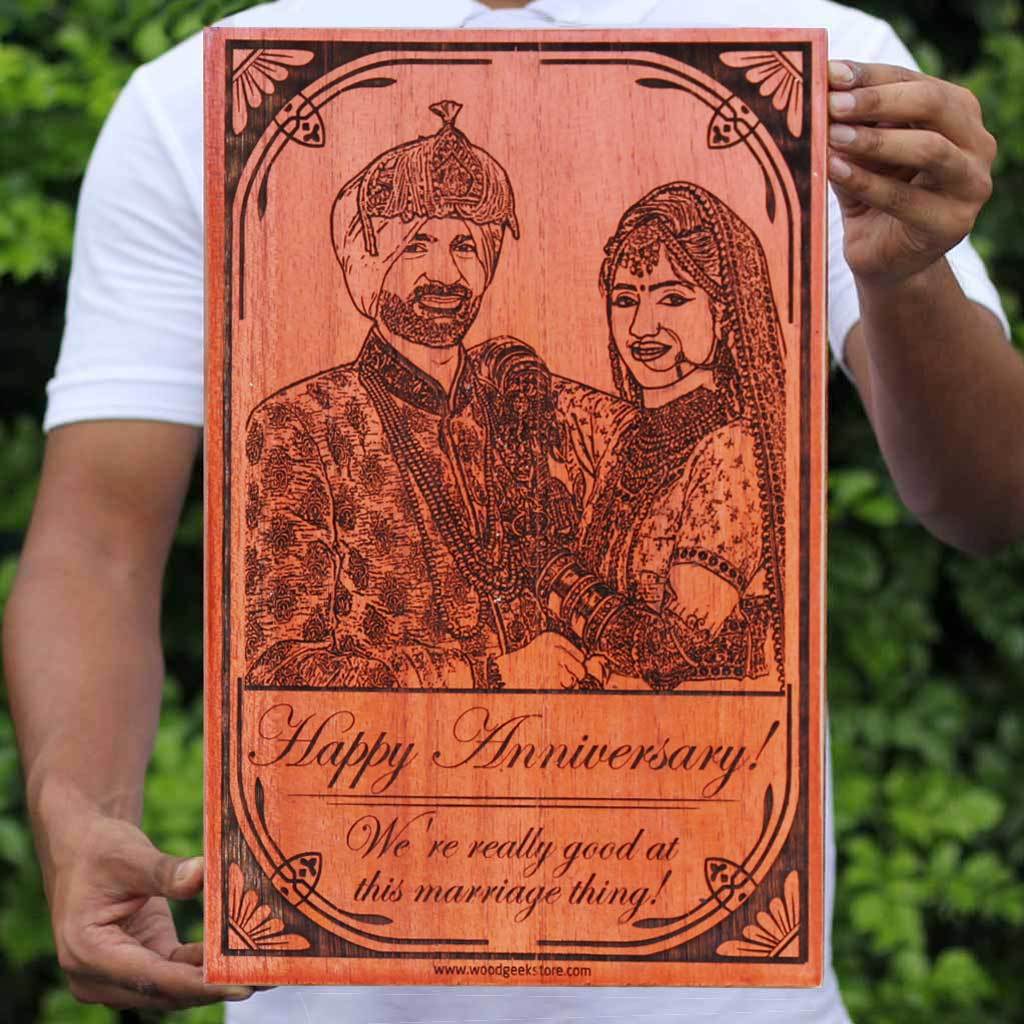 Happy Anniversary: We're really good at this marriage thing wood engraved photo. A photo on wood along with carved funny anniversary wishes. This photo gift is the best anniversary gift for husband or wife.