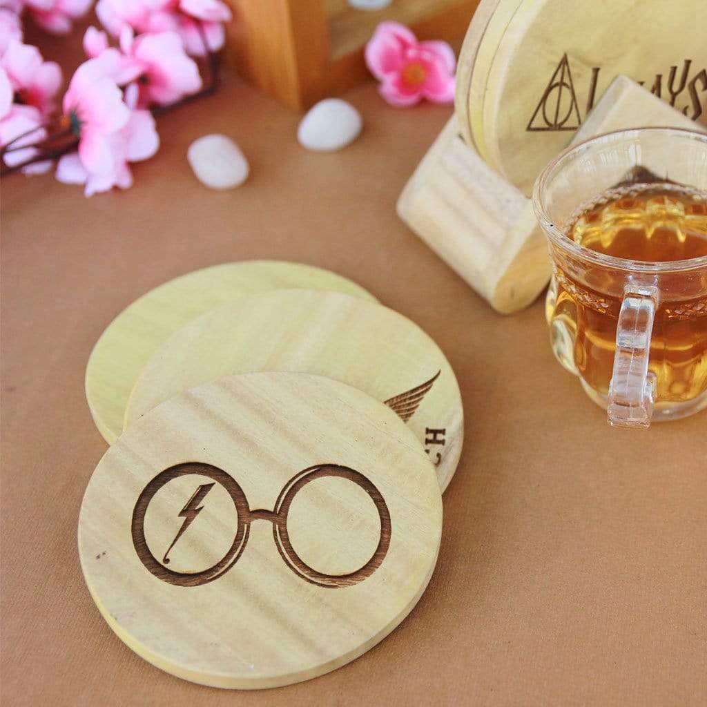 Harry Potter Coasters - Wooden Coaster Set With Holder. These wooden coasters are the best Harry Potter merchandise to own. Looking for Harry Potter gifts? These table coasters are the perfect gifts for harry potter fans.