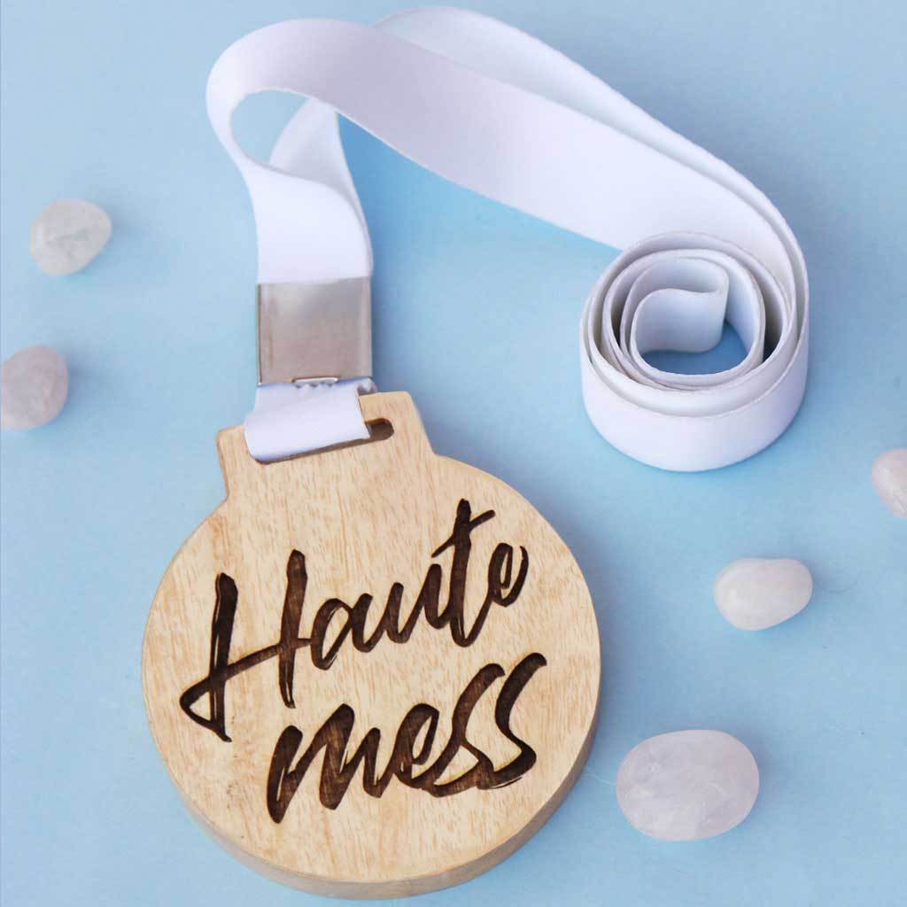 Haute Mess Wooden Medal. This Wooden Medal Comes Engraved On Mahogany Wood or Birch Wood. These Funny Medals And Trophies Make The Best Gift Ideas for Friends