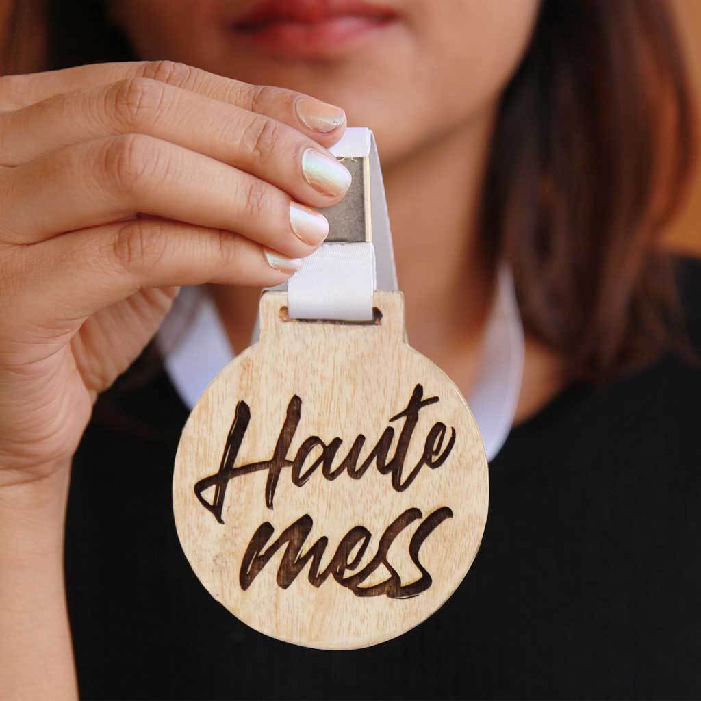 Haute Mess Wooden Medal. This Wooden Medal Comes Engraved On Mahogany Wood or Birch Wood. These Funny Medals And Trophies Make The Best Gift Ideas for Friends