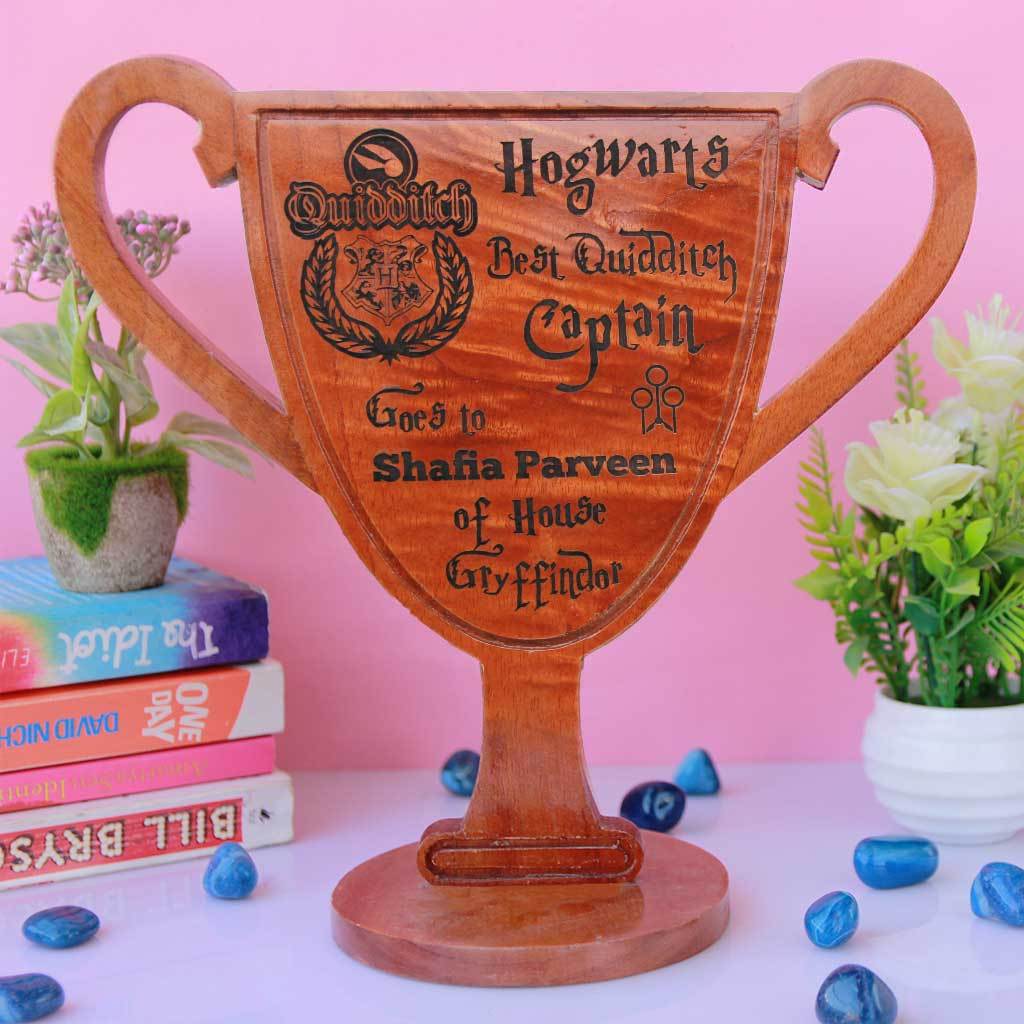 Hogwarts Best Quidditch Captain Wooden Award & Trophy Cup. This Is One Of The Best Personalized Harry Potter Gifts for Potterheads. These Harry Potter Gifts will make great birthday gift ideas for friends.