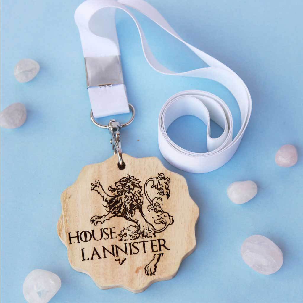 House Lannister Engraved Medal. A unique award that makes great gifts for game of thrones fans. Buy House Lannister sigil engraved custom medals online from The Woodgeek Store. 