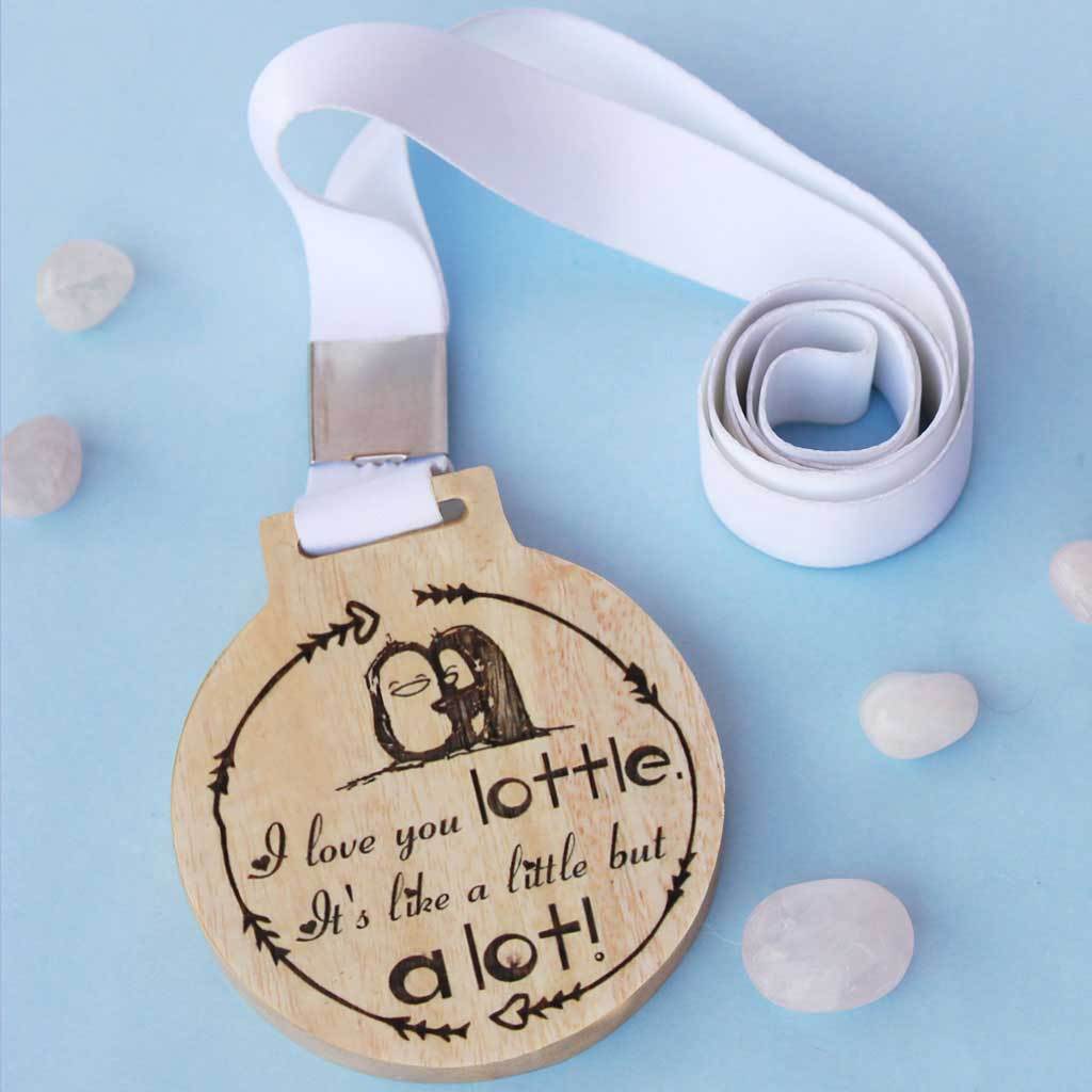 I Love You A Lottle Medal With Ribbon. They Make The Best Gifts Ideas For family. A Great Birthday Gift Idea For Friends. A special gift for her. A cool gift for her.