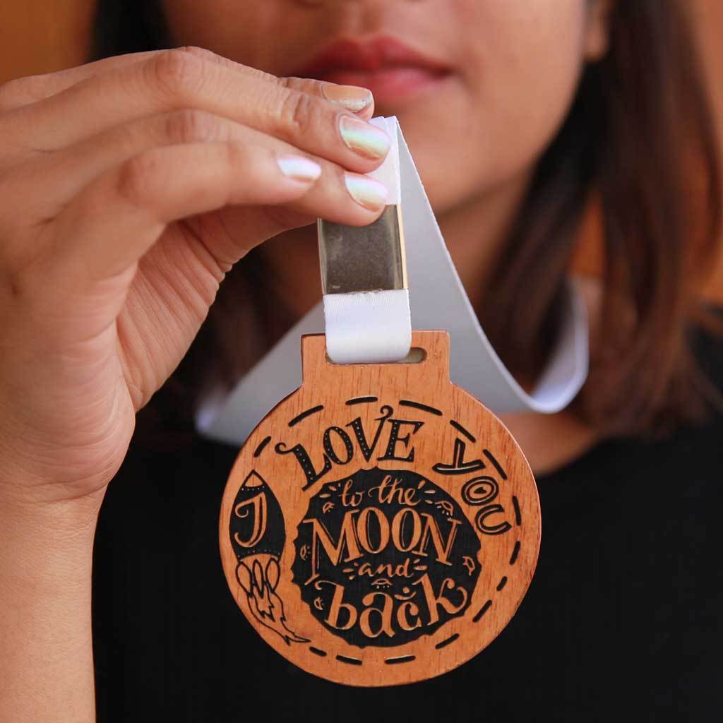 I Love You To The Moon And Back Medal Of Love. This Medal Is A Very Romantic Gift For Him And Her. These Medals And Trophies Also Make Great Gift For Family. 