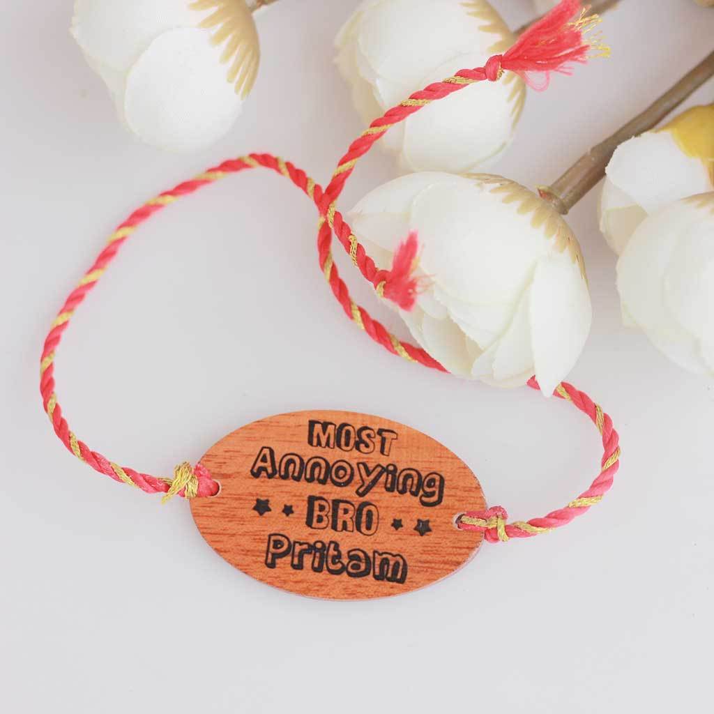 Most Annoying Bro Personalised Rakhi for Brother. This Wooden Rakhi Can be Personalised With A Name. This Is The Best Rakhi Gift To Wish Your Brother Happy Rakhi. Buy Rakhis Online and Send Rakhis Online With Woodgeek Store.