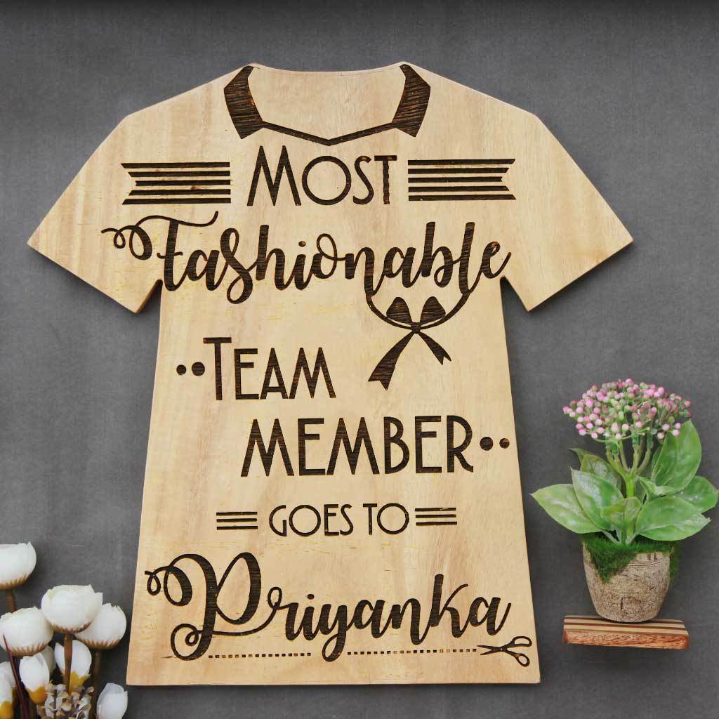 Most Fashionable Team Member Wooden T-shirt Award Plaque. These Wooden Trophies & Awards Make Unique Gifts For Employees. This Is a Highly Coveted Employee Awards Titles. Custom Trophies Are Great Gifts For Fashion Lovers.
