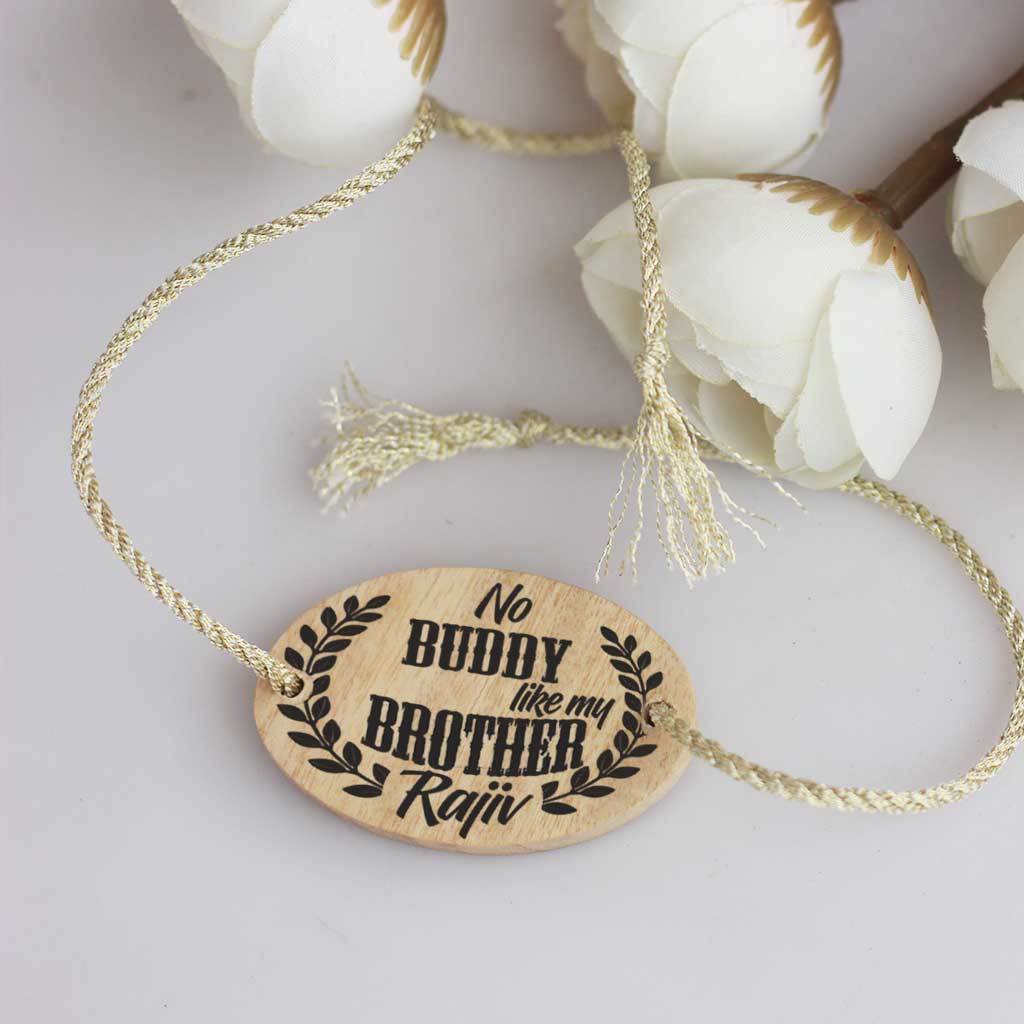 No Buddy Like A Brother Personalized Wooden Rakhi This Personalised Rakhi can be customised with a name. The wooden Rakhi card can be engraved with Raksha Bandhan greetings. Buy Rakhi Online &amp; Send Rakhi Online with Woodgeek Store