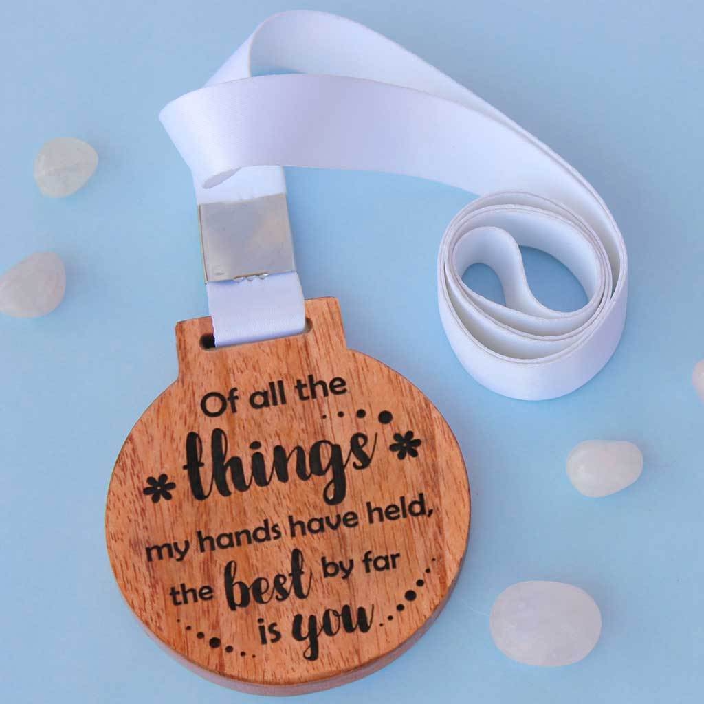 Of All The Things My Hands Have Held, The Best By Far Is You Medal. This Unique Medal Makes A Perfect Gift For Him & Her. This Medal Also Makes One Of The Best Gifts for daughter or son.