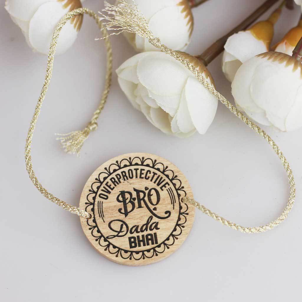 Overprotective Bro Personalized Rakhi for Brother &amp; Raksha Bandhan Greeting Card - This Wooden Fancy Rakhi Can be Personalized With A Name - This Customized Rakhi Also Comes With A Wooden Rakhi Card Engraved With Raksha Bandhan Greetings - Buy Beautiful Rakhi Online And Personalized Rakhi Gifts For Brother Or Sister From The Woodgeek Store.