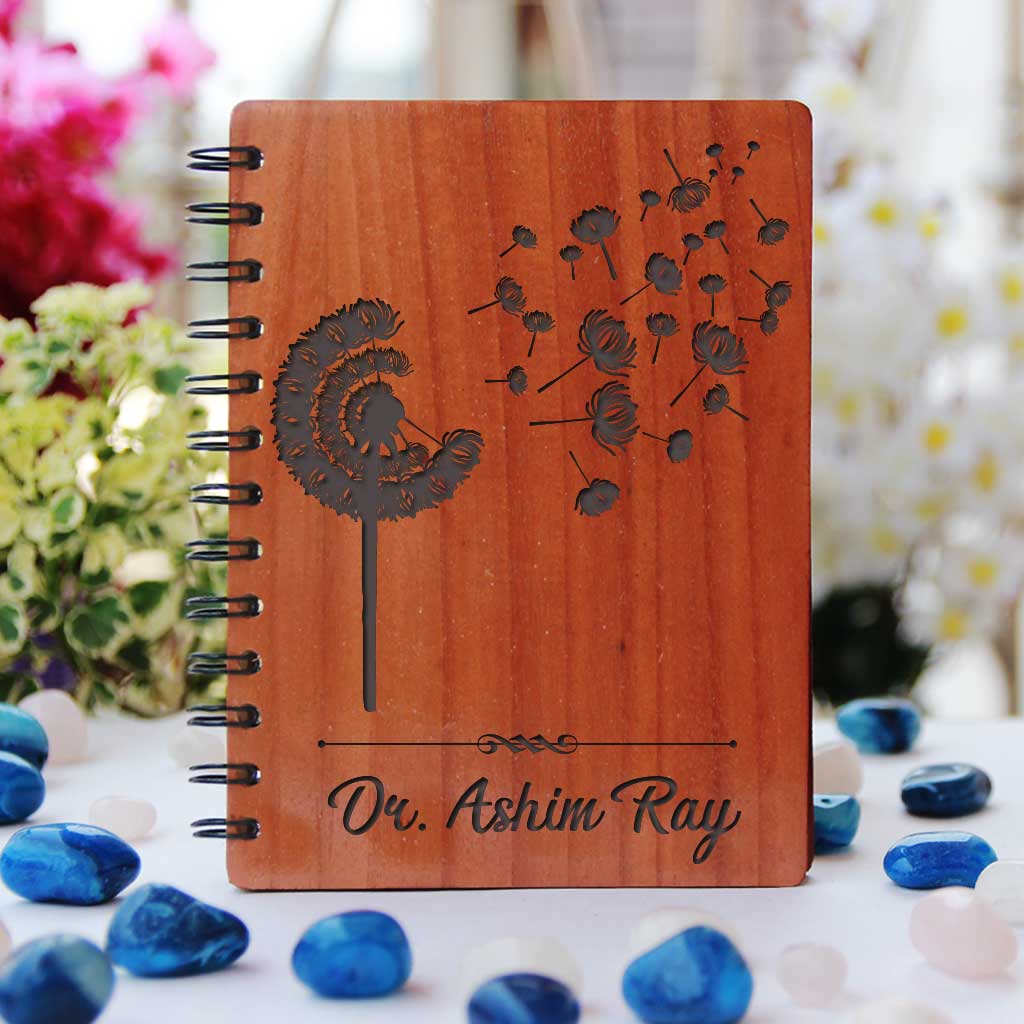 A Minimalist Wooden Notebook Engraved With Dandelion & Personalized With Doctors Name. Looking For Thank You Gifts For Doctors, Retirement Gifts For Doctors Or Graduation Gifts For Doctors? This Spiral Notebook Is The Best Gifts For Doctors.