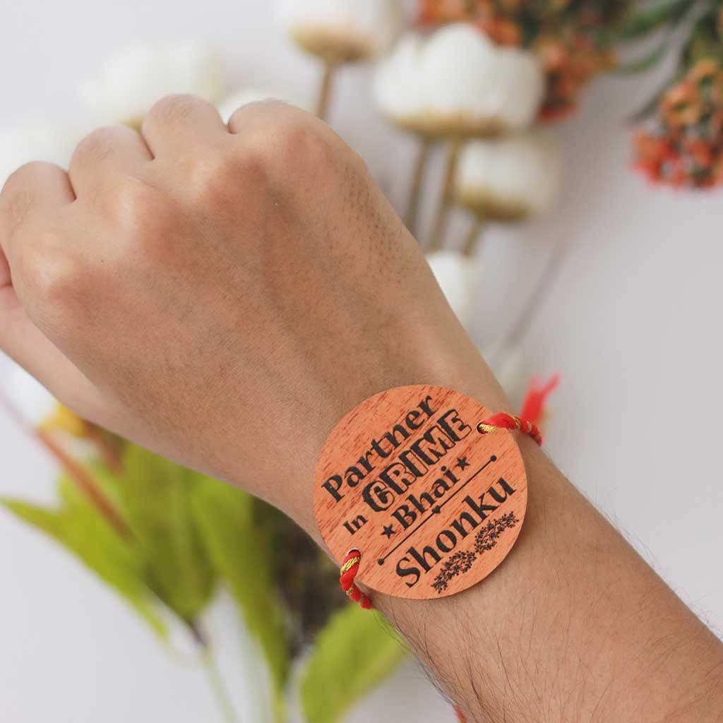 Partner In Crime Bhai Personalised Rakhi. This Wooden Rakhi Is The Best Rakhi Gift For Brother. Buy Rakhi Online &amp; Send Rakhi Online With Woodgeek Store