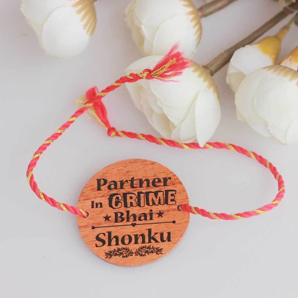 Partner In Crime Bhai Personalised Rakhi. This Wooden Rakhi Is The Best Rakhi Gift For Brother. Buy Rakhi Online &amp; Send Rakhi Online With Woodgeek Store