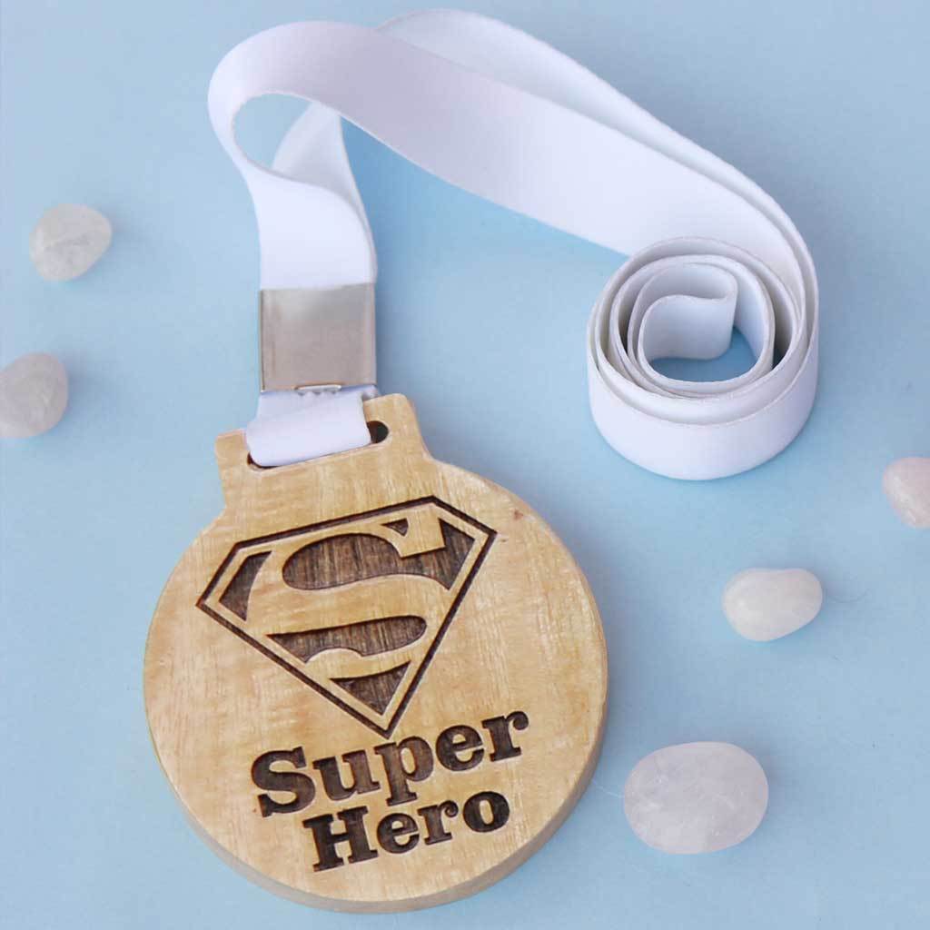 Superhero Wooden Medal With Ribbon. This Custom Medal Is The Best Gift For Dad, Mom, Brother Or Sister. A Great Appreciation Award For The Super Hero Of Your Life. Buy Medals Online From The Woodgeek Store.