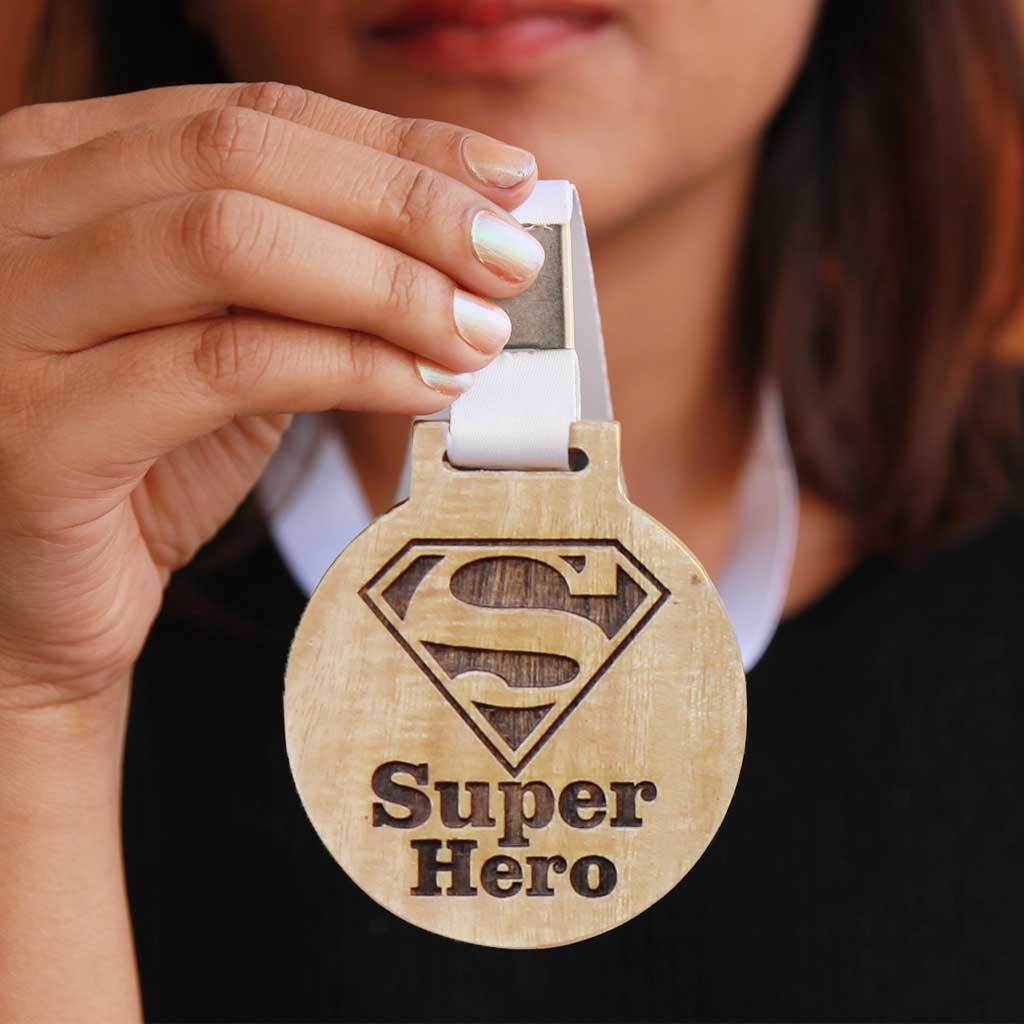 Superhero Wooden Medal With Ribbon. This Custom Medal Is The Best Gift For Dad, Mom, Brother Or Sister. A Great Appreciation Award For The Super Hero Of Your Life. Buy Medals Online From The Woodgeek Store.