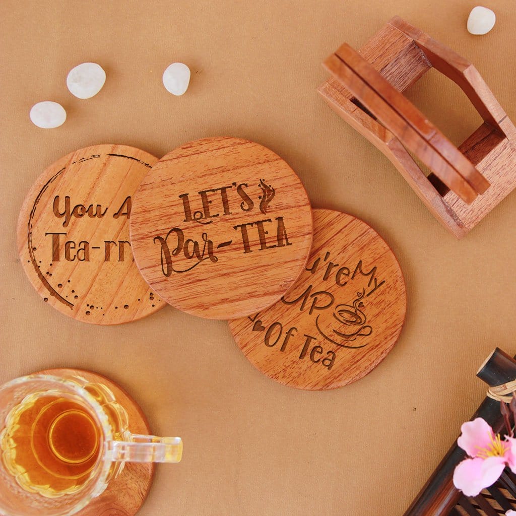 Tea Coaster Engraved With Tea Quotes. Tea Coaster Set. This Wooden Tea Coaster Set Comes with Coaster Holder & Makes Great Gifts For Tea Lovers. Buy Coasters Online At Woodgeek Store