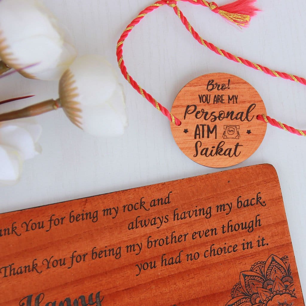 Bro You're My Personal ATM Wooden Rakhi & Greeting Card. This Personalised Rakhi can be customised with a name. The wooden Rakhi card can be engraved with Raksha Bandhan greetings. Buy Rakhi Online & Send Rakhi Online with Woodgeek Store