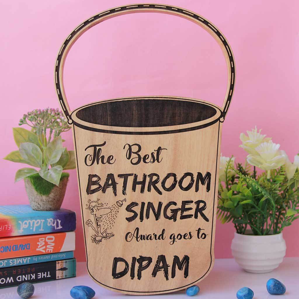 The Best Bathroom Singer Bucket Trophy. These trophies and awards makes funny gifts for friends. Gift this funny award to the bathroom singer in your life. This wooden trophy can be custom engraved with a name.