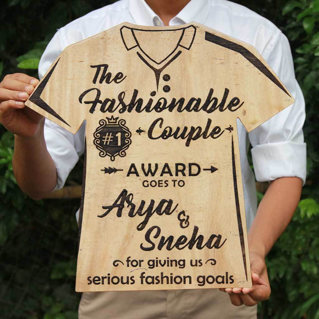 The Fashionable Couple Wooden T-Shirt Award Trophy - This Custom Engraved Wooden Plaque Makes One Of The Most Trendy Gifts For Fashion Lovers - Looking For Couple Awards ? Buy Personalized Gifts For Couples From The Woodgeek Store. 