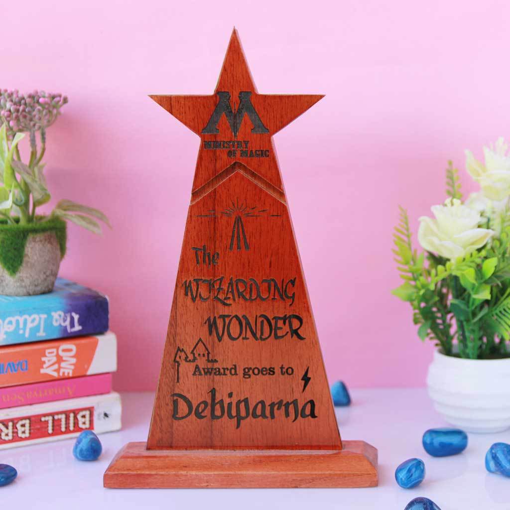 The Wizarding Wonder Star Trophy Awarded by The Ministry of Magic to the biggest Harry Potter fan. This is one of the best gifts for Harry Potter fans. Custom Trophies and awards are great personalized Harry Potter gifts for Potterheads.