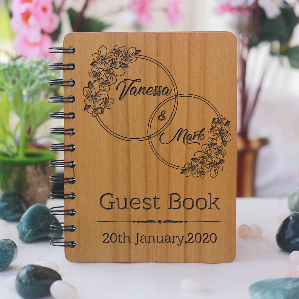 A personalised wedding guest book engraved with names and wedding date. This wood bound notebook makes a great wedding guest book. This is the best wedding journal.