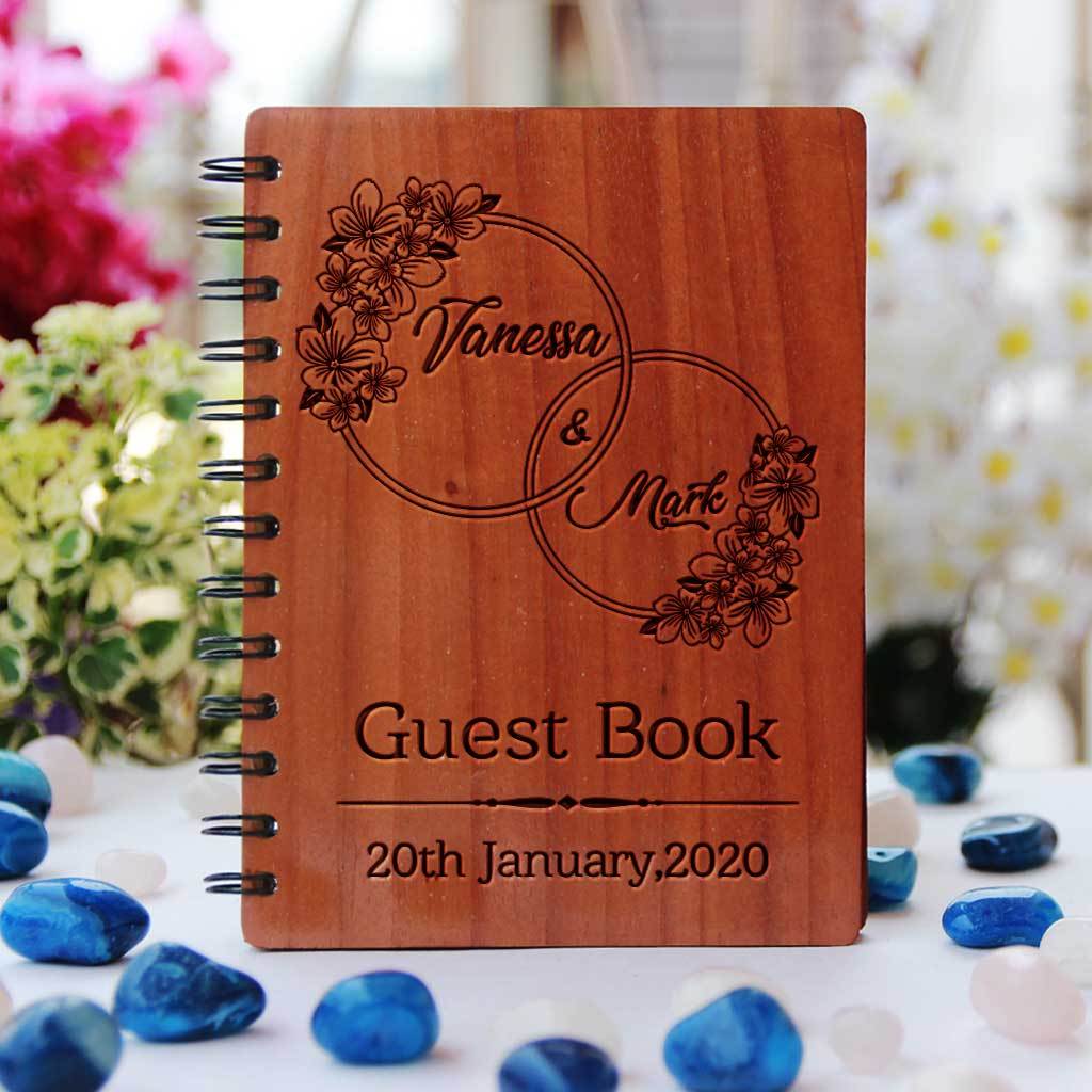 A personalised wedding guest book engraved with names and wedding date. This wood bound notebook makes a great wedding guest book. This is the best wedding journal.