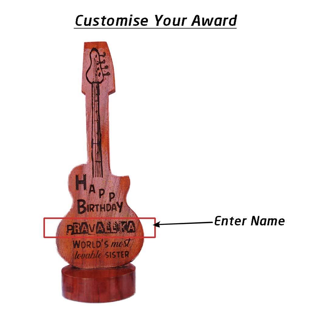 Happy Birthday To The World&#39;s Most Lovable Sister Custom Wooden Plaque.  This Personalized Plaque Comes In The Shape Of A Guitar. This Wooden Stand makes Unique Gifts For Sisters. Shop More Personalized Birthday Gifts For Sisters Online From The Woodgeek Store.