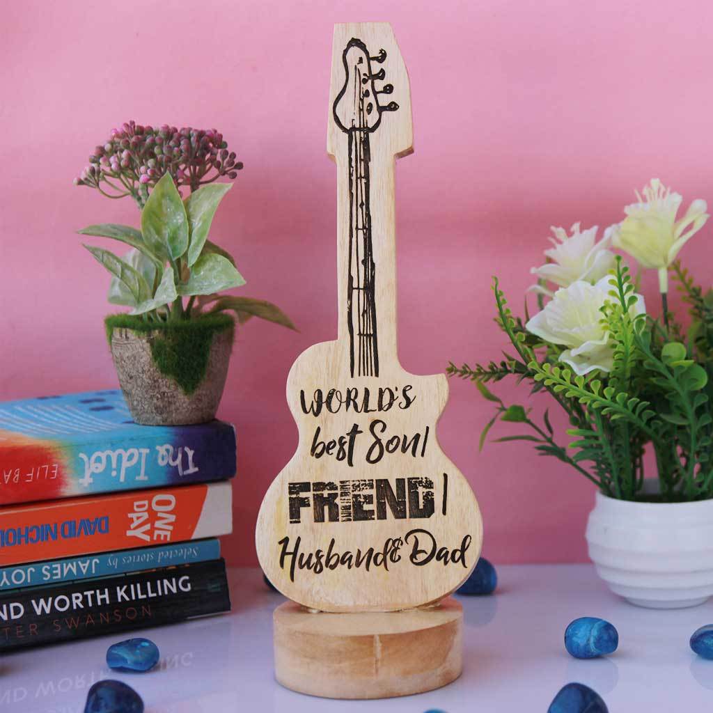 World&#39;s Best Son/ Friend/ Husband And Dad Wooden Award &amp; Trophy In The Shape Of A Guitar.  This Custom Trophy Makes Unusual Gift Ideas For Loved Ones. Shop More Customized Awards Online From The Woodgeek Store.