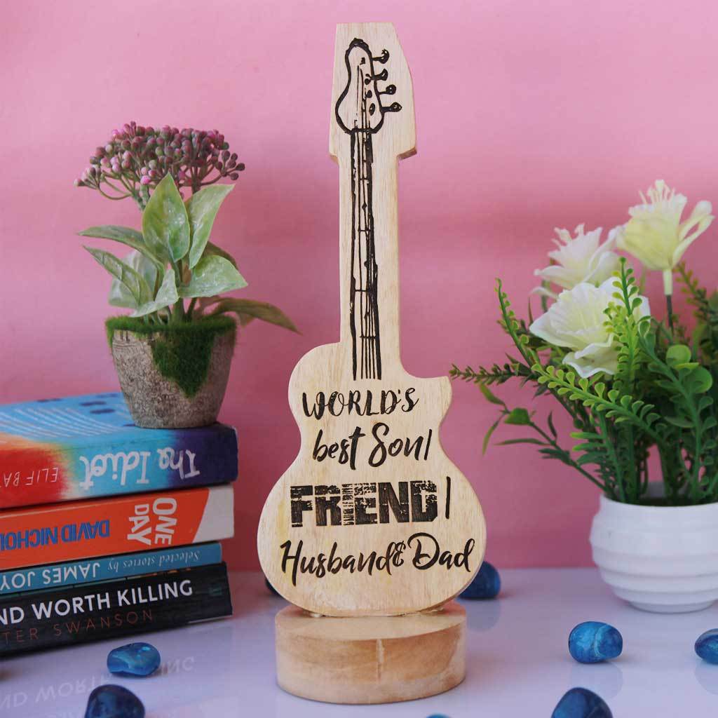 World's Best Son/ Friend/ Husband And Dad Wooden Award & Trophy In The Shape Of A Guitar.  This Custom Trophy Makes Unusual Gift Ideas For Loved Ones. Shop More Customized Awards Online From The Woodgeek Store.