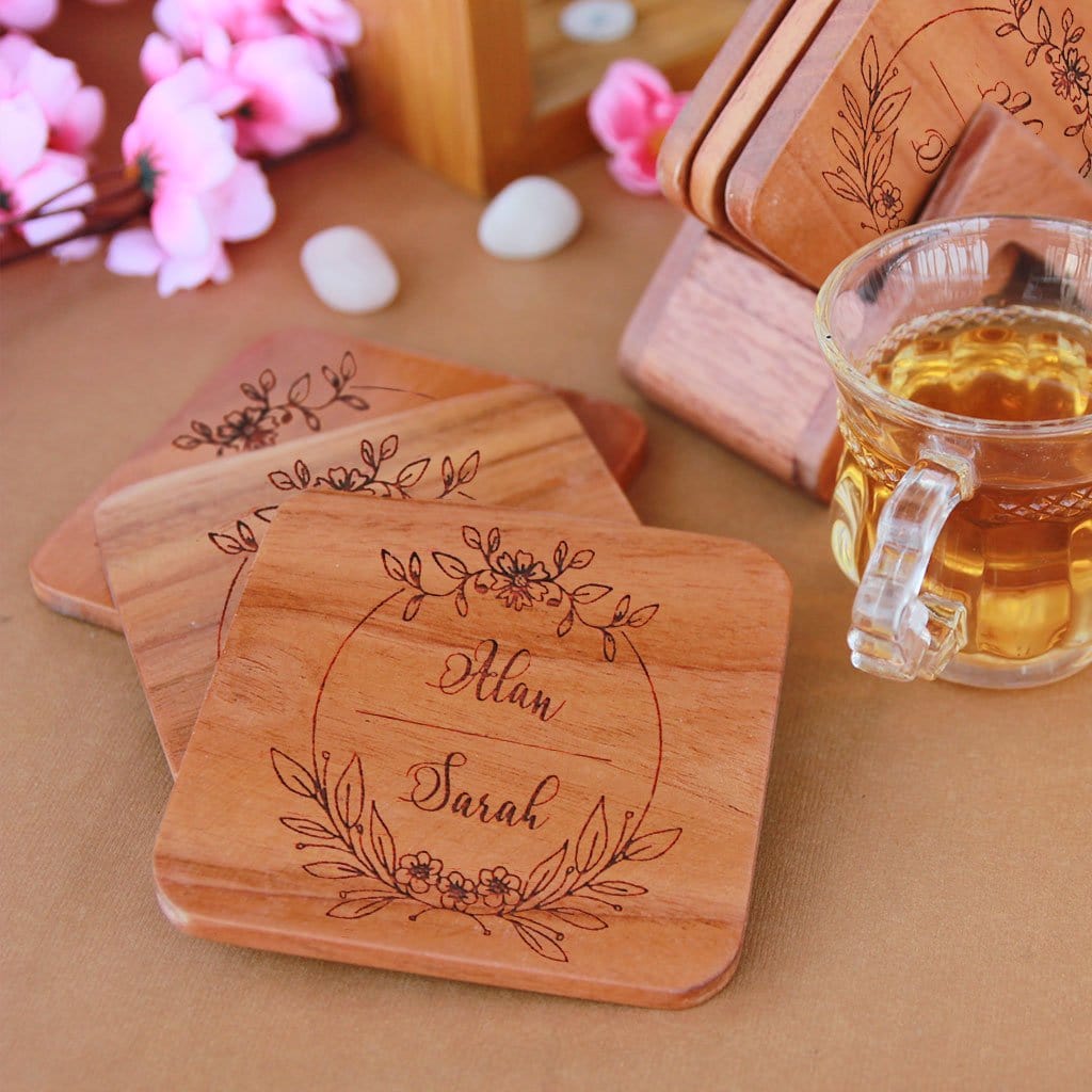Custom Coasters Engraved With Couple Name - Wooden Coaster Set With Holder. Looking for couple gifts or housewarming gifts? This tea coaster set make unique gifts for couples. These wooden coasters also make great wedding gifts for couples and gift for newly married couple.