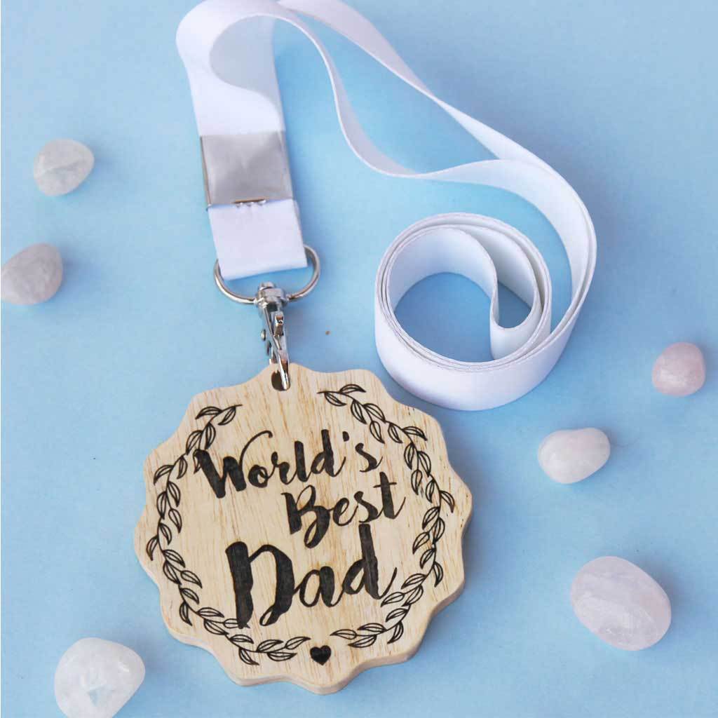 World's Best Dad Engraved Medal. It Is The Best Birthday Gift For Dad Or Father's Day Gift. Buy More Customised Gifts For Parents From The Woodgeek Store.